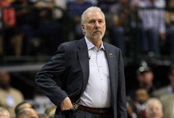 DALLAS - APRIL 25:  Head coach Gregg Popovich of the San Antonio Spurs during play against the Dallas Mavericks in Game Four of the Western Conference Quarterfinals during the 2009 NBA Playoffs at American Airlines Center on April 25, 2009 in Dallas, Texas. NOTE TO USER: User expressly acknowledges and agrees that, by downloading and or using this photograph, User is consenting to the terms and conditions of the Getty Images License Agreement.  (Photo by Ronald Martinez/Getty Images)