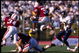18 Nov 1995: Running back Mike Mitchell of the Stanford Cardinal leaps over an offensive lineman as he carries the football during the Cardinal's 29-24 victory over the California Golden Bears at Stanford Stadium in Stanford, California. Mandatory Credi