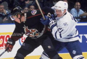 11 Dec 2001:  Center Robert Reichel #21 of the Toronto Maple Leafs checks left wing Ladislav Nagy #17 of the Phoenix Coyotes during the NHL game at the Air Canada Centre in Toronto, Canada . The Leafs defeated the Coyotes 6-3. Mandatory Copyright Notice: Copyright 2001 NHLI Mandatory Credit: Dave Sandford /Getty Images/NHLI