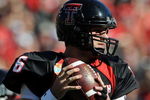 DALLAS - JANUARY 02:  Quarterback Graham Harrell #6 the Texas Tech Red Raiders drops back to pass against the Mississippi Rebels during the AT&T Cotton Bowl on January 2, 2009 at the Cotton Bowl in Dallas, Texas.  (Photo by Ronald Martinez/Getty Images)