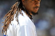 LOS ANGELES, CA - APRIL 19:  Manny Ramirez #99 of the Los Angeles Dodgers on base against the Colorado Rockies during the game at Dodger Stadium on April 19, 2009 in Los Angeles, California.  (Photo by Harry How/Getty Images)