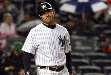 NEW YORK - MAY 05:  Johnny Damon #18 of the New York Yankees bats against the Boston Red Sox on May 5, 2009 at Yankee Stadium in the Bronx borough of New York City. The Red Sox defeated the Yankees 7-3.  (Photo by Jim McIsaac/Getty Images)
