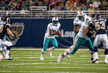 ST. LOUIS, MO - NOVEMBER 30:  Ricky Williams #34 of the Miami Dolphins runs against the St. Louis Rams at the Edward Jones Dome on November 30, 2008 in St. Louis, Missouri.  The Dolphins beat the Rams 16-12.  (Photo by Dilip Vishwanat/Getty Images)