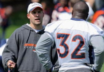 ENGLEWOOD, CO - MAY 03:  Head coach Josh McDaniels of the Denver Broncos chats with running back LaMont Jordan #32 during minicamp at the Broncos training facility on May 3, 2009 in Englewood, Colorado.  (Photo by Doug Pensinger/Getty Images)