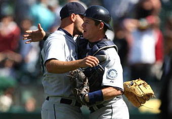 OAKLAND, CA - APRIL 12: David Aardsma  #53 and Rob Johnson #32 of the Seattle Mariners celebrate after defeating the Oakland Athletics during a Major League Baseball game on April 12, 2009 at the Oakland Coliseum in Oakland, California.  (Photo by Jed Jacobsohn/Getty Images)