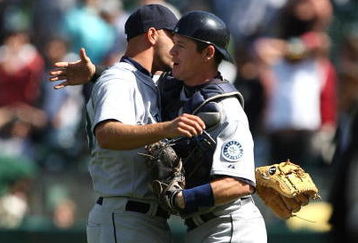 OAKLAND, CA - APRIL 12: David Aardsma  #53 and Rob Johnson #32 of the Seattle Mariners celebrate after defeating the Oakland Athletics during a Major League Baseball game on April 12, 2009 at the Oakland Coliseum in Oakland, California.  (Photo by Jed Jacobsohn/Getty Images)