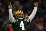 GREEN BAY, WI - JANUARY 20:  Quarterback Brett Favre #4 of the Green Bay Packers reacts after a Packers touchdown during the NFC championship game against the New York Giants on January 20, 2008 at Lambeau Field in Green Bay, Wisconsin. The Giants defeated the Packers 23-20 in overtime to advance to the Superbowl XLII.  (Photo by Jonathan Daniel/Getty Images)
