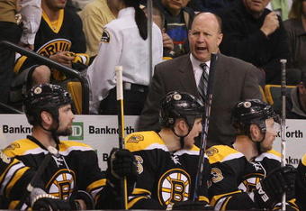 BOSTON - MAY 01:  Head coach Claude Julien of the Boston Bruins directs his players in the third period against the Carolina Hurricanes during Game One of the Eastern Conference Semifinal Round of the 2009 Stanley Cup Playoffs on May 1, 2009 at the TD Banknorth Garden in Boston, Massachusetts. The Bruins defeated the Hurricanes 4-1.  (Photo by Elsa/Getty Images)