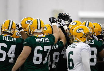 GREEN BAY, WI - MAY 1:  Green Bay Packers players huddle as a team as they participate in practice drills during Green Bay Packers Minicamp at Don Hutson Center on May 1, 2009 in Green Bay, Wisconsin. (Photo by Scott Boehm/Getty Images)