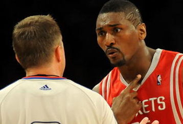 LOS ANGELES, CA - MAY 06:  Ron Artest #96 of the Houston Rockets points to his neck as he talks with referee Bill Spooner before he was ejected in the fourth quarter against the Los Angeles Lakers in Game Two of the Western Conference Semifinals during the 2009 NBA Playoffs at Staples Center on May 6, 2009 in Los Angeles, California. NOTE TO USER: User expressly acknowledges and agrees that, by downloading and or using this photograph, User is consenting to the terms and conditions of the Getty Images License Agreement.  (Photo by Harry How/Getty Images)