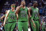 ORLANDO, FL - MAY 08:  Paul Pierce #34, Brian Scalabrine#44 and Kendrick Perkins #43 of the Boston Celtics walk onto the court against the Orlando Magic in Game Three of the Eastern Conference Semifinals during the 2009 NBA Playoffs at Amway Arena on May 8, 2009 in Orlando, Florida. NOTE TO USER: User expressly acknowledges and agrees that, by downloading and or using this photograph, User is consenting to the terms and conditions of the Getty Images License Agreement.  (Photo by Marc Serota/Getty Images)