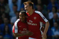 PORTSMOUTH, UNITED KINGDOM - MAY 02:  Nicklas Bendtner of Arsenal (R) celebrates with team mate Theo Walcott as he scores their first goal during the Barclays Premier League match between Portsmouth and Arsenal at Fratton Park on May 2, 2009 in Portsmouth, England.  (Photo by Paul Gilham/Getty Images)