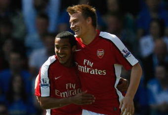 PORTSMOUTH, UNITED KINGDOM - MAY 02:  Nicklas Bendtner of Arsenal (R) celebrates with team mate Theo Walcott as he scores their first goal during the Barclays Premier League match between Portsmouth and Arsenal at Fratton Park on May 2, 2009 in Portsmouth, England.  (Photo by Paul Gilham/Getty Images)