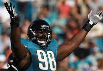 JACKSONVILLE, FL - OCTOBER 26:  John Henderson #98 of the Jacksonville Jaguars asks the crowd for noise in a game against the Cleveland Browns at Jacksonville Muncipal Stadium on October 26, 2008 in Jacksonville, Florida.  (Photo by Sam Greenwood/Getty Images)