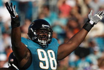 JACKSONVILLE, FL - OCTOBER 26:  John Henderson #98 of the Jacksonville Jaguars asks the crowd for noise in a game against the Cleveland Browns at Jacksonville Muncipal Stadium on October 26, 2008 in Jacksonville, Florida.  (Photo by Sam Greenwood/Getty Images)