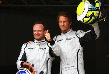BARCELONA, SPAIN - MAY 09:  (L-R) Third placed Rubens Barrichello of Brazil and Brawn GP and pole sitter Jenson Button of Great Britain and Brawn GP celebrate in parc ferme following qualifying for the Spanish Formula One Grand Prix at the Circuit de Catalunya on May 9, 2009 in Barcelona, Spain.  (Photo by Paul Gilham/Getty Images)