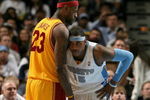 DENVER - DECEMBER 19:  LeBron James #23 of the Cleveland Cavaliers faces off against Carmelo Anthony #15 of the Denver Nuggets at the Pepsi Center on December 19, 2008 in Denver, Colorado. James scored a game high 33 points as the Cavaliers defeated the Nuggets 105-88.  (Photo by Doug Pensinger/Getty Images)