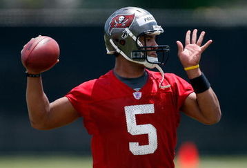 TAMPA - MAY 01:  Quarterback Josh Freeman #5 of the Tampa Bay Buccaneers throws a pass during the Buccaneers Rookie Minicamp at One Buccaneer Place on May 1, 2009 in Tampa, Florida.  (Photo by J. Meric/Getty Images)
