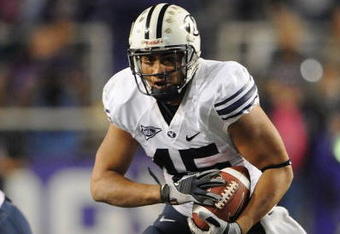 FORT WORTH, TX - OCTOBER 16:  Running back Harvey Unga #45 of the BYU Cougars runs against the TCU Horned Frogs at Amon G. Carter Stadium on October 16, 2008 in Fort Worth, Texas.  (Photo by Ronald Martinez/Getty Images)