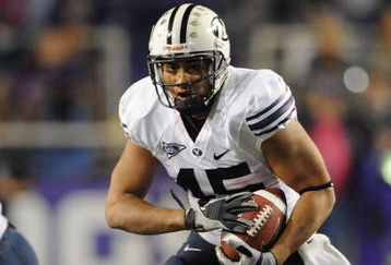 FORT WORTH, TX - OCTOBER 16:  Running back Harvey Unga #45 of the BYU Cougars runs against the TCU Horned Frogs at Amon G. Carter Stadium on October 16, 2008 in Fort Worth, Texas.  (Photo by Ronald Martinez/Getty Images)