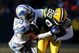 GREEN BAY, WI - DECEMBER 28: Ernie Sims #50 of the Detroit Lions brings down James Jones #89 of the Green Bay Packers on December 28, 2008 at Lambeau Field in Green Bay, Wisconsin. The Packers defeated the Lions 31-21. (Photo by Jonathan Daniel/Getty Images)