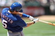OAKLAND, CA - MAY 07: Ian Kinsler #5 of the Texas Rangers bats against the Oakland Athletics during a Major League Baseball game on May 7, 2009 at the Oakland Coliseum in Oakland, California. (Photo by Jed Jacobsohn/Getty Images)
