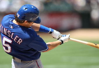 OAKLAND, CA - MAY 07:  Ian Kinsler #5 of the Texas Rangers bats against the Oakland Athletics during a Major League Baseball game on May 7, 2009 at the Oakland Coliseum in Oakland, California.  (Photo by Jed Jacobsohn/Getty Images)