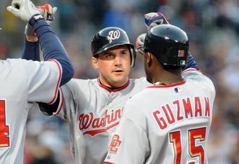 ATLANTA - APRIL 11: Infielder Ryan Zimmerman #11 of the Washington Nationals celebrates a home run against the Atlanta Braves April 11, 2009 at Turner Field in Atlanta, Georgia.  (Photo by Al Messerschmidt/Getty Images)