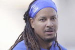 LOS ANGELES, CA - APRIL 15:  Manny Ramirez #99 of the Los Angeles Dodgers looks on with his long hair during batting practice before the game against the San Francisco Giants on April 15, 2009 at Dodger Stadium in Los Angeles, California.  All Major League Baseball players wore #42 in honor of Jackie Robinson day.  (Photo by Kevork Djansezian/Getty Images)