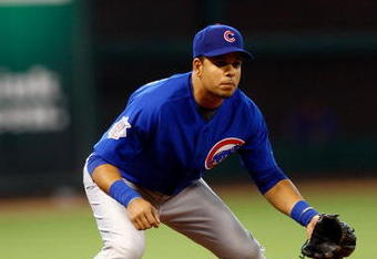 HOUSTON - APRIL 06:  Aramis Ramirez #16 of the Chicago Cubs fields against the Houston Astros during the Opening Day game on April 6, 2009 at Minute Maid Park in Houston, Texas.  (Photo by Chris Graythen/Getty Images)