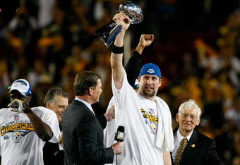 TAMPA, FL - FEBRUARY 01:  Quarterback Ben Roethlisberger #7 of the Pittsburgh Steelers celebrates with the Vince Lombardi Trophy after the Steelers won 27-23 against the Arizona Cardinals during Super Bowl XLIII on February 1, 2009 at Raymond James Stadium in Tampa, Florida.  (Photo by Win McNamee/Getty Images)