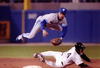 Roberto Alomar of the Toronto Blue Jays goes airbourne over Chicago White Sox Dan Pasqua to convert the double play. Mandatory Credit: Jonathan Daniel/ALLSPORT
