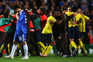 LONDON, ENGLAND - MAY 06:  Barcelona celebrate victory in the UEFA Champions League Semi Final match between Chelsea and Barcelona as Juliano Belletti of Chelsea looks dejected at Stamford Bridge on May 6, 2009 in London, England.  (Photo by Jamie McDonald/Getty Images)