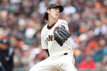 SAN FRANCISCO - APRIL 07:  Tim Lincecum #55 of the San Francisco Giants pitches against the Milwaukee Brewers during Opening Day of the Major League Baseball season on April 7, 2009 at AT&T Park in San Francisco, California.  (Photo by Jed Jacobsohn/Getty Images)