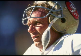 14 Oct 1990: A portrait of quarterback Joe Montana of the San Francisco 49ers as he stands on the sideline with his helmet off during a defensive series in the 49ers 45-35 victory over the Atlanta Falcons at Georgia Dome in Atlanta, Georgia.