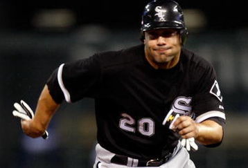 KANSAS CITY, MO - MAY 05:  Carlos Quentin #20 of the Chicago White Sox runs from second base during a game against the Kansas City Royals on May 5, 2009 at Kauffman Stadium in Kansas City, Missouri.  (Photo by Jamie Squire/Getty Images)