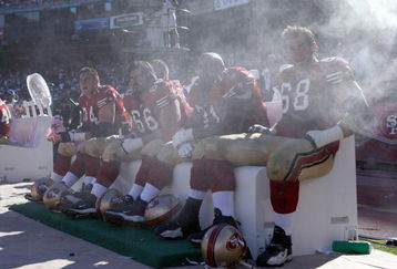 SAN FRANCISCO - OCTOBER 07: Joe Staley #74, Eric Heitmann #66 Larry Allen #71 Adam Snyder #68 of the San Francisco 49ers cool off on the bench against the Baltimore Ravens during an NFL game on October 7, 2007 at Monster Park in San Francisco, California. (Photo by Jed Jacobsohn/Getty Images)