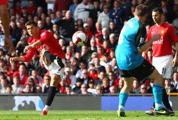 MANCHESTER, ENGLAND - APRIL 05:  Cristiano Ronaldo of Manchester United scores the opening goal during the Barclays Premier League match between Manchester United and Aston Villa at Old Trafford on April 5, 2009 in Manchester, England.  (Photo by Ryan Pierse/Getty Images)