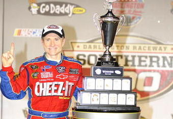 DARLINGTON, SC - MAY 09:  Mark Martin, driver of the #5 Cheez-it/Carquest Chevrolet, poses in victory lane after winning the NASCAR Sprint Cup Series Southern 500 on May 9, 2009 at Darlington Raceway in Darlington, South Carolina.  (Photo by John Harrelson/Getty Images)