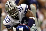 IRVING, TX - SEPTEMBER 9:  Anthony Spencer #93 of the New York Giants sacks Eli Manning #10 of the Dallas Cowboys at Texas Stadium September 9, 2007 in Irving, Texas.  (Photo by Layne Murdoch/Getty Images)