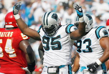 CHARLOTTE, NC - OCTOBER 05:  Charles Johnson #95 of the Carolina Panthers celebrates on the field during the game against the Kansas City Chiefs at Bank of America on October 5, 2008 in Charlotte, North Carolina.  (Photo by Kevin C. Cox/Getty Images)