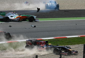 BARCELONA, SPAIN - MAY 10:  Sebastien Buemi (bottom) of Switzerland and Scuderia Toro Rosso crashes out on lap one during the Spanish Formula One Grand Prix at the Circuit de Catalunya on May 10, 2009 in Barcelona, Spain.  (Photo by Paul Gilham/Getty Images)