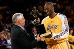 LOS ANGELES, CA - MAY 07:  NBA Commissioner David Stern presents Kobe Bryant #24 of the Los Angeles Lakers the MVP Trophy before the start of Game Two of the Western Conference Semifinals against the Utah Jazz during the 2008 NBA Playoffs on May 7, 2008 at Staples Center in Los Angeles, California.  NOTE TO USER: User expressly acknowledges and agrees that, by downloading and/or using this Photograph, user is consenting to the terms and conditions of the Getty Images License Agreement.  (Photo by Stephen Dunn/Getty Images)*** Local Caption *** Kobe Bryant;David Stern