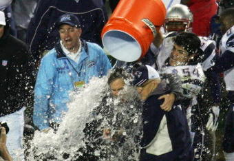 JACKSONVILLE, FL - FEBRUARY 6:   Linebacker Tedy Bruschi #54 of the New England Patriots pours the Gatorade tub over head coach Bill Belichick before defeating the Philadelphia Eagles in Super Bowl XXXIX at Alltel Stadium on February 6, 2005 in Jacksonville, Florida.  The Patriots defeated the Eagles 24-21.  (Photo by Harry How/Getty Images)