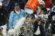 JACKSONVILLE, FL - FEBRUARY 6: Linebacker Tedy Bruschi #54 of the New England Patriots pours the Gatorade tub over head coach Bill Belichick before defeating the Philadelphia Eagles in Super Bowl XXXIX at Alltel Stadium on February 6, 2005 in Jacksonville, Florida. The Patriots defeated the Eagles 24-21. (Photo by Harry How/Getty Images)