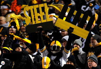 PITTSBURGH - JANUARY 11:  A fan of the Pittsburgh Steelers holds up a sign which reads Steel fence in support of the Steelers' defense against the San Diego Chargers during their AFC Divisional Playoff Game on January 11, 2009 at Heinz Field in Pittsburgh, Pennsylvania. The Steelers won 35-24. (Photo by Chris Graythen/Getty Images)