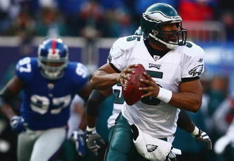 EAST RUTHERFORD, NJ -  JANUARY 11:  Quarterback Donovan McNabb #5 of the Philadelphia Eagles looks to throw a pass against the New York Giants during the NFC Divisional Playoff Game on January 11, 2009 at Giants Stadium in East Rutherford, New Jersey.  The Eagles defeated the Giants 23 -11. (Photo by Chris McGrath/Getty Images)