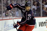 COLUMBUS, OH - APRIL 21:  Manny Malhotra #27 of the Columbus Blue Jackets controls the puck against the Detroit Red Wings during Game Three of the Western Conference Quarterfinals of the 2009 NHL Stanley Cup Playoffs at Nationwide Arena on April 21, 2009 in Columbus, Ohio.  (Photo by Joe Sargent/Getty Images)