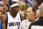 DALLAS - MAY 09:  Forward Josh Howard #5 of the Dallas Mavericks talks with NBA referee Mark Wunderlich after a 106-105 loss against the Denver Nuggets in Game Three of the Western Conference Semifinals during the 2009 NBA Playoffs at American Airlines Center on May 9, 2009 in Dallas, Texas. NOTE TO USER: User expressly acknowledges and agrees that, by downloading and or using this photograph, User is consenting to the terms and conditions of the Getty Images License Agreement.  (Photo by Ronald Martinez/Getty Images)