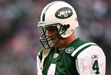 EAST RUTHERFORD, NJ - DECEMBER 14:  Brett Favre #4 of The New York Jets walks on the field against The Buffalo Bills during their game on December 14, 2008 at Giants Stadium in East Rutherford, New Jersey.  (Photo by Al Bello/Getty Images)